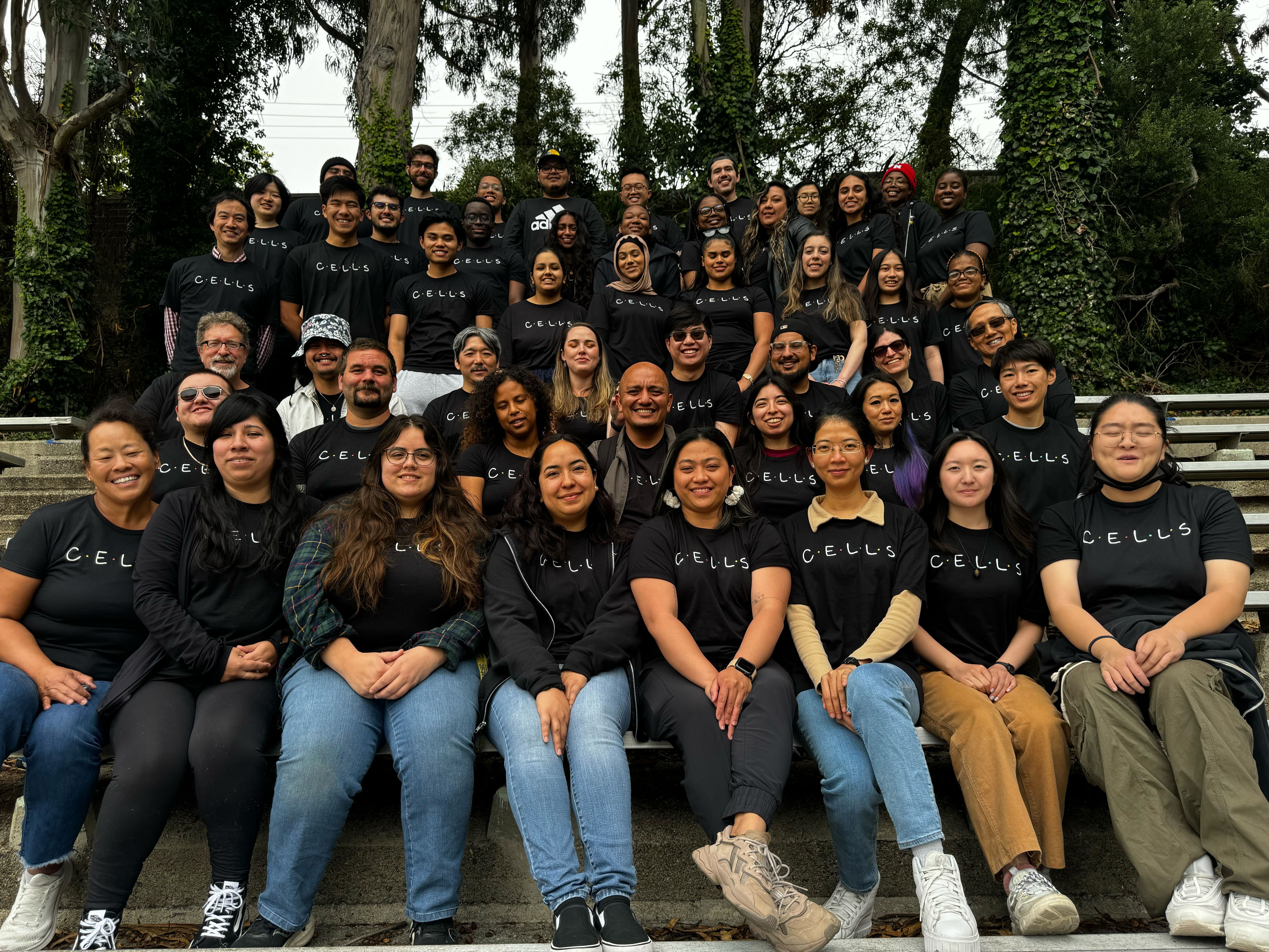 Large group of students and mentors in matching Tshirts